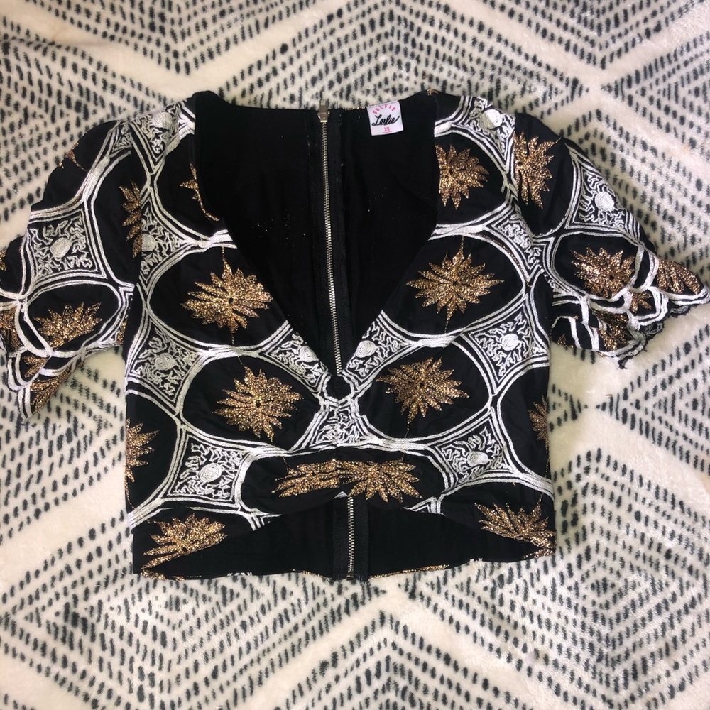 Fancy gold and black zip up